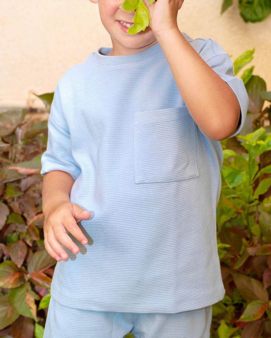 Breathable kids set with neutral top and shorts made from natural fibers
